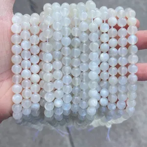 Close-up of A-grade natural white moonstone round beads for DIY jewelry making accessories