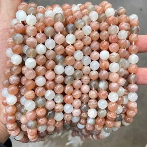 Macro view of natural mixed color moonstone and sunstone round beads for jewelry DIY
