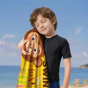 Detailansicht eines weichen Mikrofaser-Strandtuchs mit Affen-Cartoon für Kinder