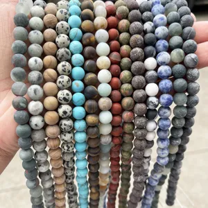 Diverse matte natural stone round beads for DIY jewelry making and crafts.