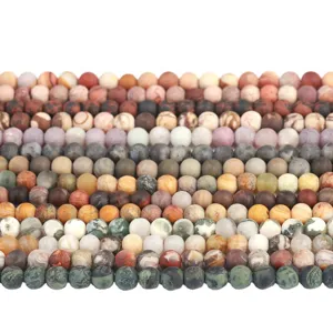 Rows of matte frosted natural stone round beads for DIY jewelry making