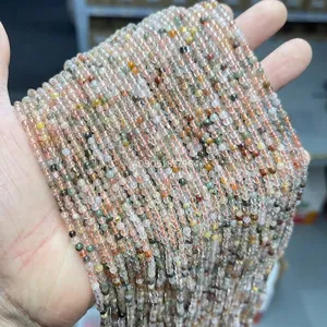 Macro view of 3mm natural colorful rutilated quartz round beads for DIY jewelry making