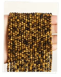 Detail view of high-quality natural yellow tiger eye beads for DIY jewelry making