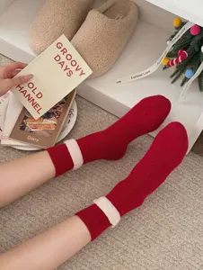 Cozy red thick wool mid-calf socks for women, warm winter thermal fleece socks with stylish cuffs.