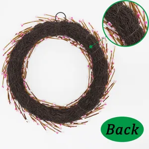 Detailed macro view showing the sturdy woven back of the decorative berry wreath.