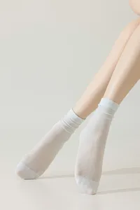 Women's summer thin mulberry silk mid-calf socks, breathable and soft lightweight hosiery.
