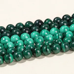 Rows of polished natural green malachite round beads for DIY jewelry making accessories