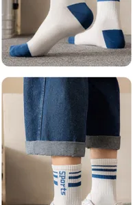 Detailed close-up shot of men's athletic crew socks with stylish white and blue block pattern.