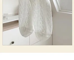 White knit socks detail view, breathable textured short socks for women daily wear.