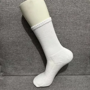 Detail view of white men's cotton mid-tube sports socks, breathable ribbed fabric design.
