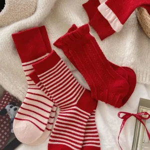 Red wool thermal mid-calf socks for women, cozy winter striped and solid red knit hosiery.