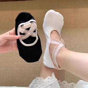 Women's non-slip yoga socks with cross lace straps, perfect for pilates, dance and fitness workouts.