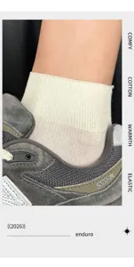 White cotton short socks for women, breathable and comfortable summer thin design style.
