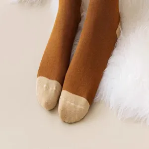 Detail shot of women winter thermal thick loop socks, cozy fleece lining and warm design.