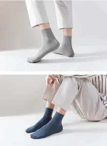 Men's solid color cotton mid-calf dress socks detail, breathable thin business style.