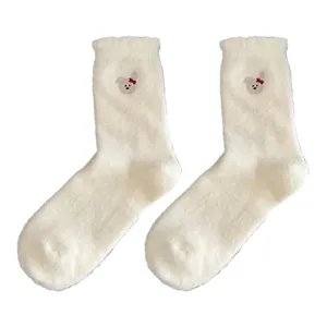 Cozy thick plush winter warm mid-tube socks for women with cute embroidered bow design.