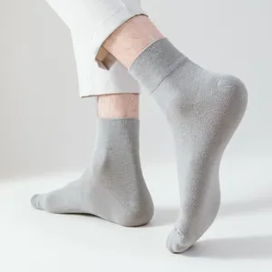 Men solid color cotton mid-tube socks, breathable casual business socks for daily wear.