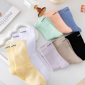 Colorful ribbed mid-calf women socks with cute letter prints for daily casual wear.