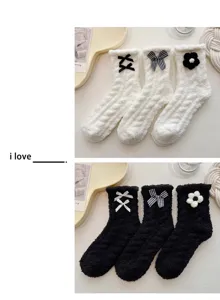 Cozy coral fleece socks detail featuring soft plush texture, cute bows and flower decor.