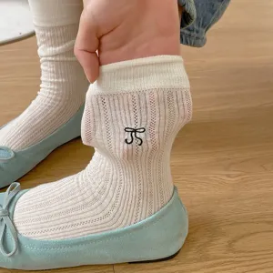 Summer thin breathable mesh mid-calf socks with delicate black bow embroidery detail.