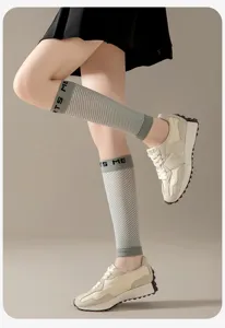 Compression calf sleeves for women, summer thin running sports support with striped design.