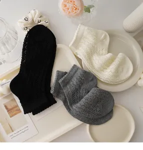 Detail view of Japanese hollow mesh lace socks for women, cute lolita summer short socks.