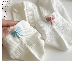 White cotton short socks with cute embroidery bow for women summer style detail view
