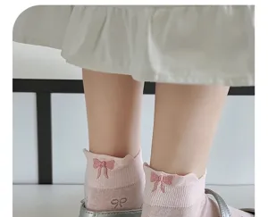 Cute pink low-cut ankle socks with sweet embroidered bow details, thin cotton style for spring and summer.