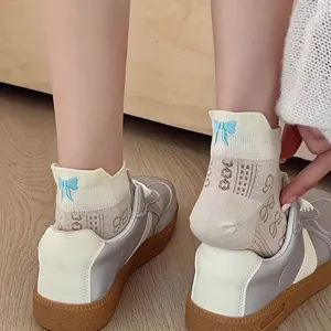 Cute bow cotton short socks for women, breathable retro monogram casual ankle socks.