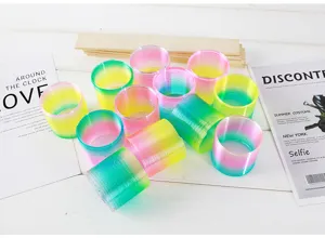 Juguete mágico colorido de resorte arcoíris con detalles brillantes para la descompresión.