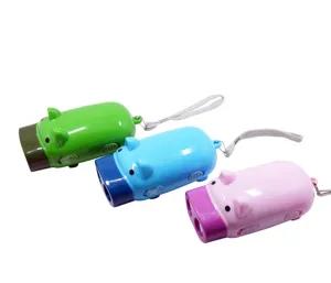 Détail de mini lampe torche cochon à pression, LED d'urgence autonome maison et voyage.