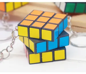Mini 3x3 Rubik's cube keychain puzzle toy pendant with metal chain for bags keys and gifts.