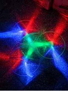 LED flashing pull string flying saucer toy, glowing bamboo dragonfly for night market.