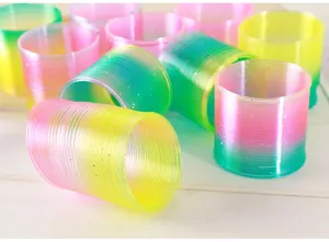 Juguete de resorte de arco iris mágico colorido, resorte de plástico estirable clásico niños.