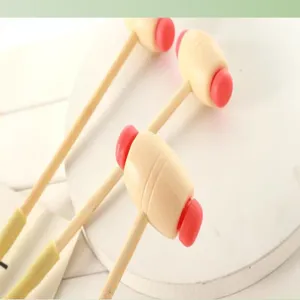 Wooden massage hammer with red plastic head, back knocking tool for daily relaxation use.