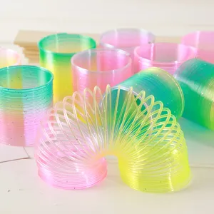 Juego de juguetes de resorte de arco iris mágico colorido para fiestas infantiles y relax.