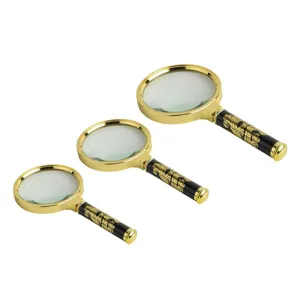 Draagbare handleesvergrootglas set met gouden lijst en traditioneel drakenpatroon handvat.