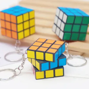 Mini 3x3 magic cube keychain pendant, cute educational puzzle toy accessory for keys and bags.