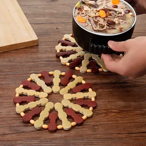 Wooden round trivet heat insulation mat for hot pots bowls and cups, natural bamboo kitchen pad.