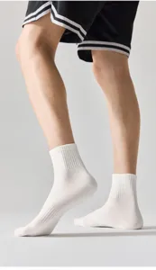 Comfortable white mid-tube athletic socks for men and women, breathable and soft daily wear.