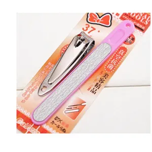 Closeup of stainless steel nail clipper and pink frosted nail file detail for daily use kit.