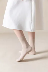 Comfortable women's mid-tube cotton socks detail shot showcasing soft texture and rib cuff.