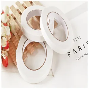 White double-sided foam tape detail view, strong adhesive tape for home and office use.