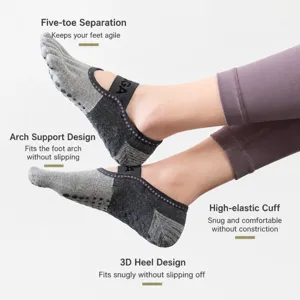 Non-slip yoga socks with five toe separation, arch support and breathable cotton for pilates fitness.