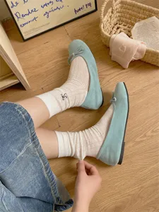 Korean style summer thin breathable mid-tube socks paired with sweet bow flat shoes.