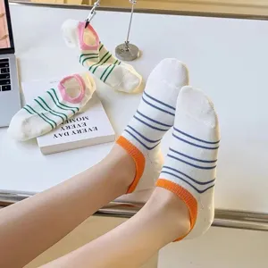 Detailed shot of comfortable summer low-cut striped invisible socks, breathable ankle socks.