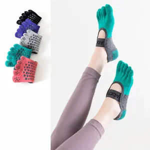 Professional non-slip five-toe yoga socks with breathable PVC silicone grips for pilates fitness.