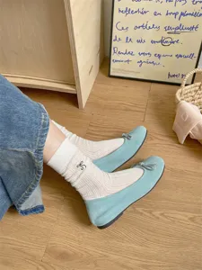 Korean style women mid-tube ribbed socks with ballet flat shoes, soft and breathable daily wear.