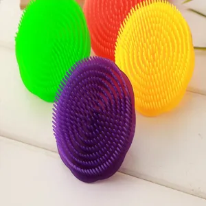 Silicone scalp massage shampoo brush detail view, soft rubber bristles for deep cleaning.