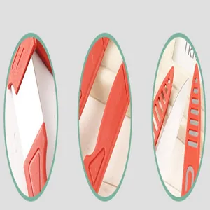 Detailed close-up view of kitchen fruit knife stainless steel blade red plastic handle.
